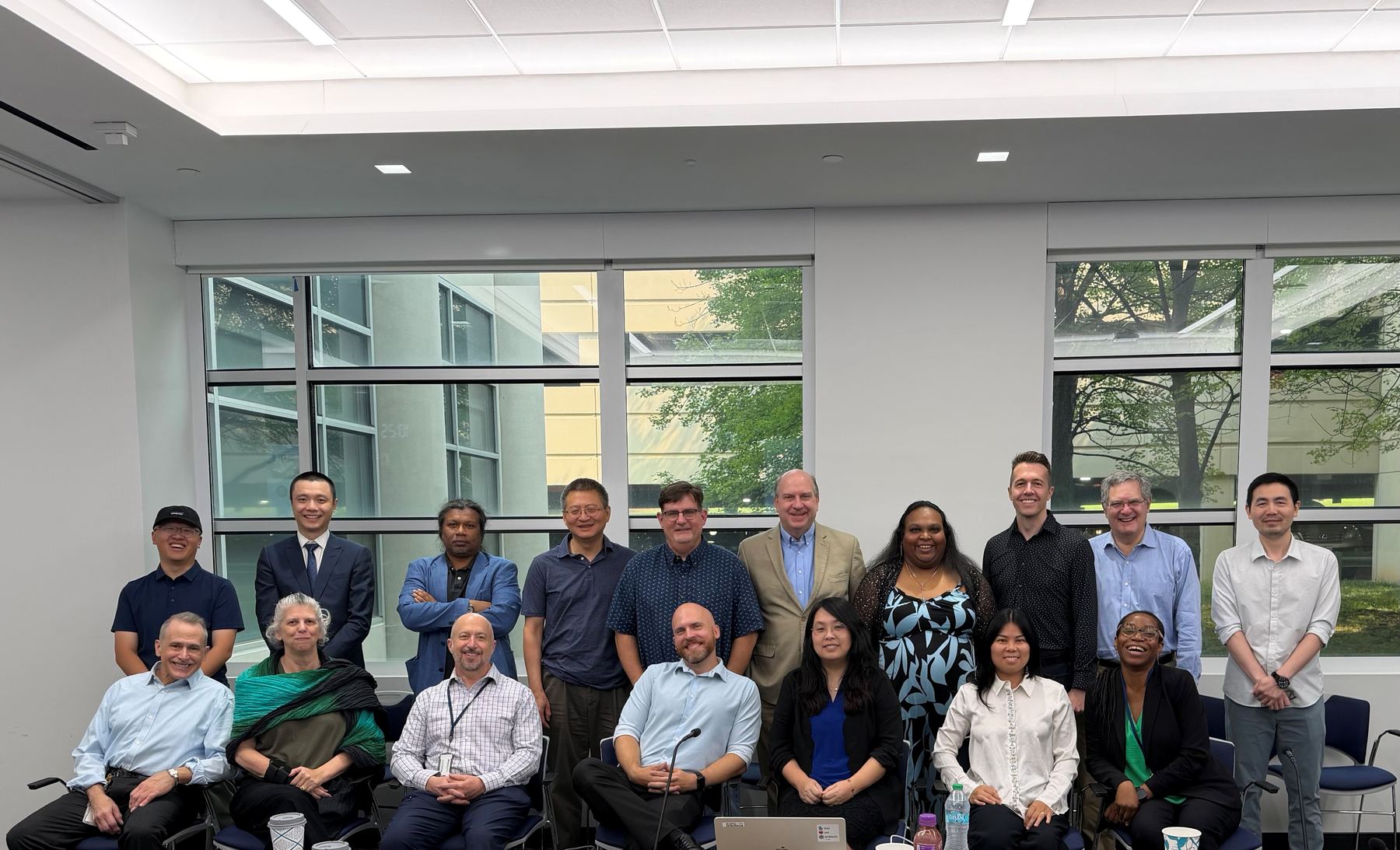 Members of the Accelerate BASSO Network at the 2026 in-person network meeting, gathered in two rows in a meeting room.
